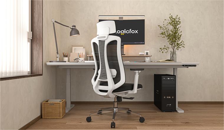 A scenery of white and black ergonomic chairs, with a computer on a standing desk. 